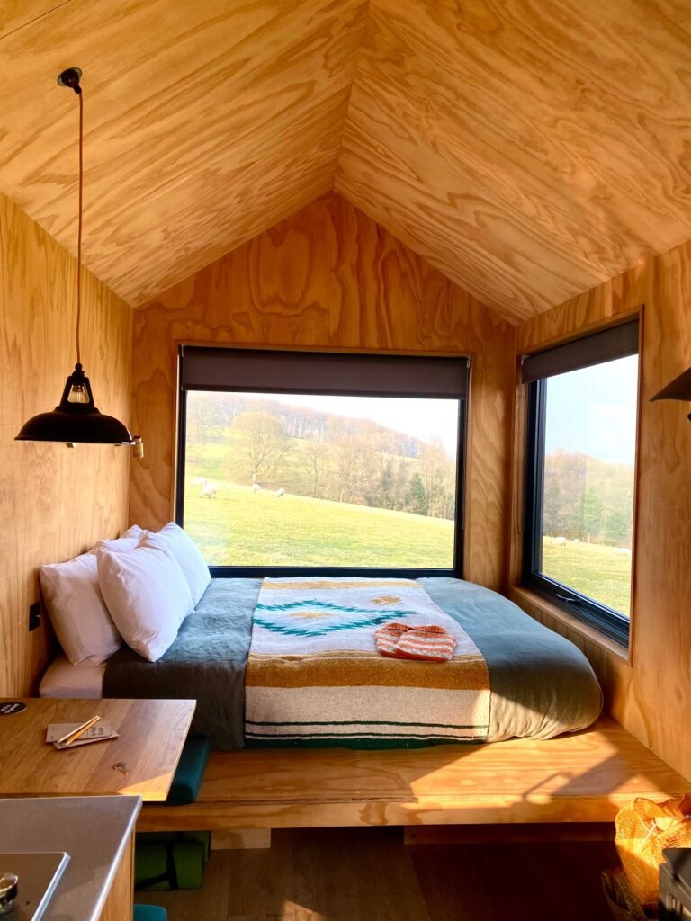 Inside of a cabin in UK, with wide views to the rolling hills