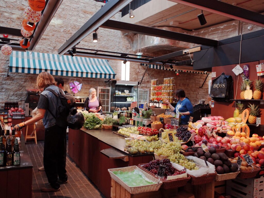 Scene of a market in Tallinn with colorful fruits and vegetables