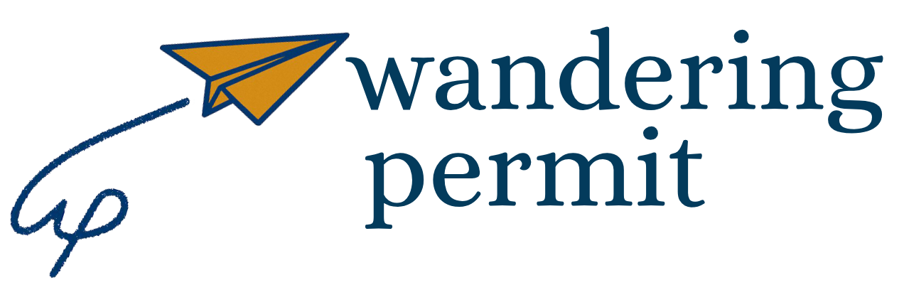 Wandering permit logo with a yellow and blue paper kit alongside wandering permit text