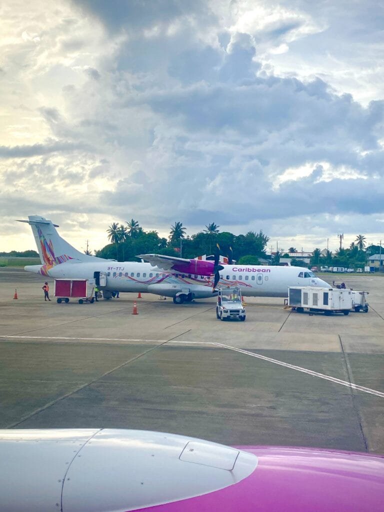 caribbean airlines plane on runway at ANR Airport in trinidad and tobago