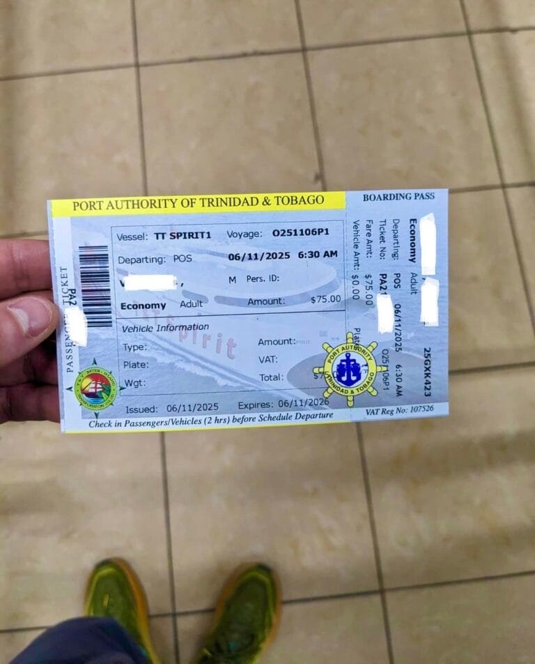 hand holding a ferry ticket issued by port authority of trinidad & tobago