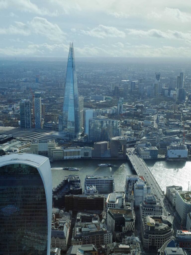 View from Horizon 22 showing The Shard, the River Thames, and surrounding London buildings from above.